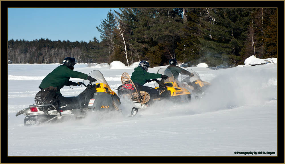 The Crew on Snowmobiles