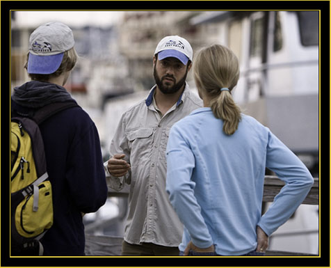 Derek. Luke & Heidi discussing the daily plan