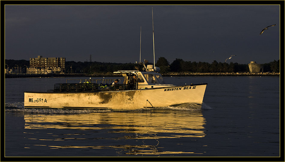 A Lobster boat illuminated in early light