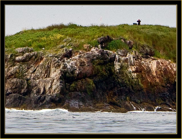 A biologist on Outer Green viewing us transit the island