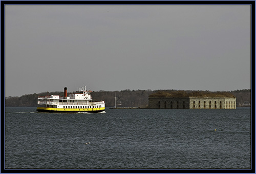 Ferry passing Fort Gorges from Portland Breakwater Lighthouse - South Portland, Maine