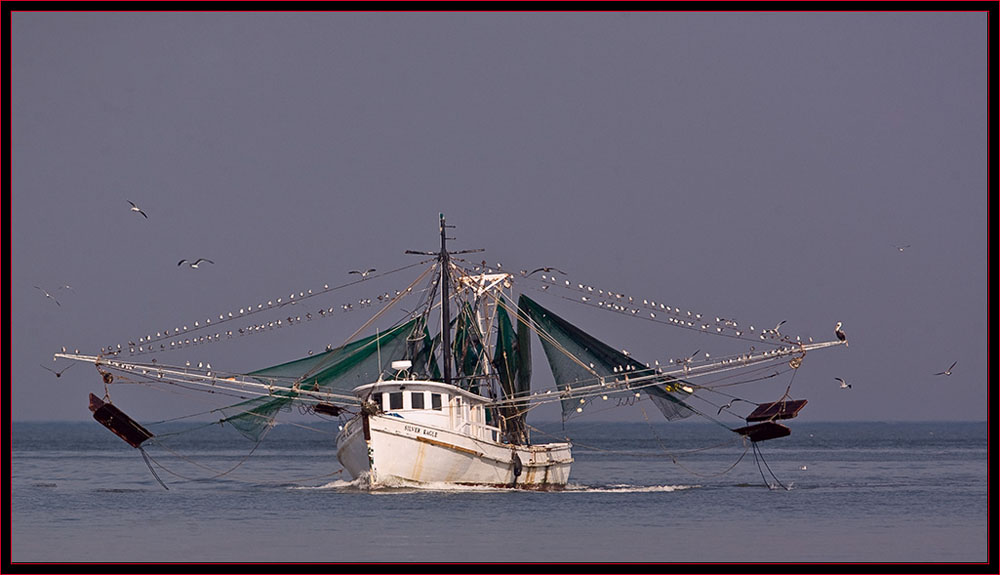 Fishing Vessel off the beach